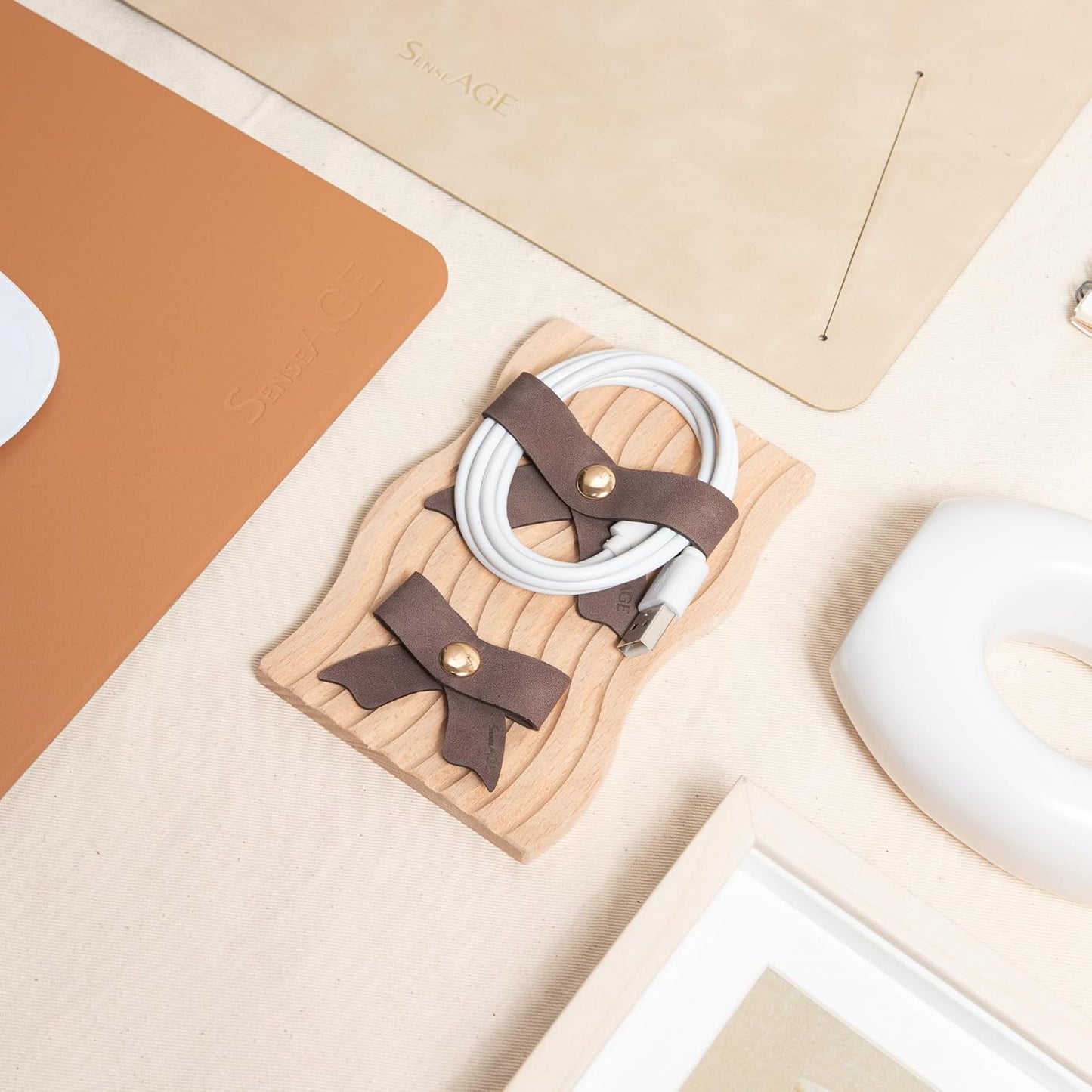 SenseAGE 5 Pack Cord Organizer, Bow Cord Keeper, Cable Organizer USB Holder, Leather Cable Management, Cable Straps, Earphone Winder, Storage Straps for Electronics, Earbuds (Camel Brown, Small)